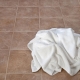 Soggy towel on floor